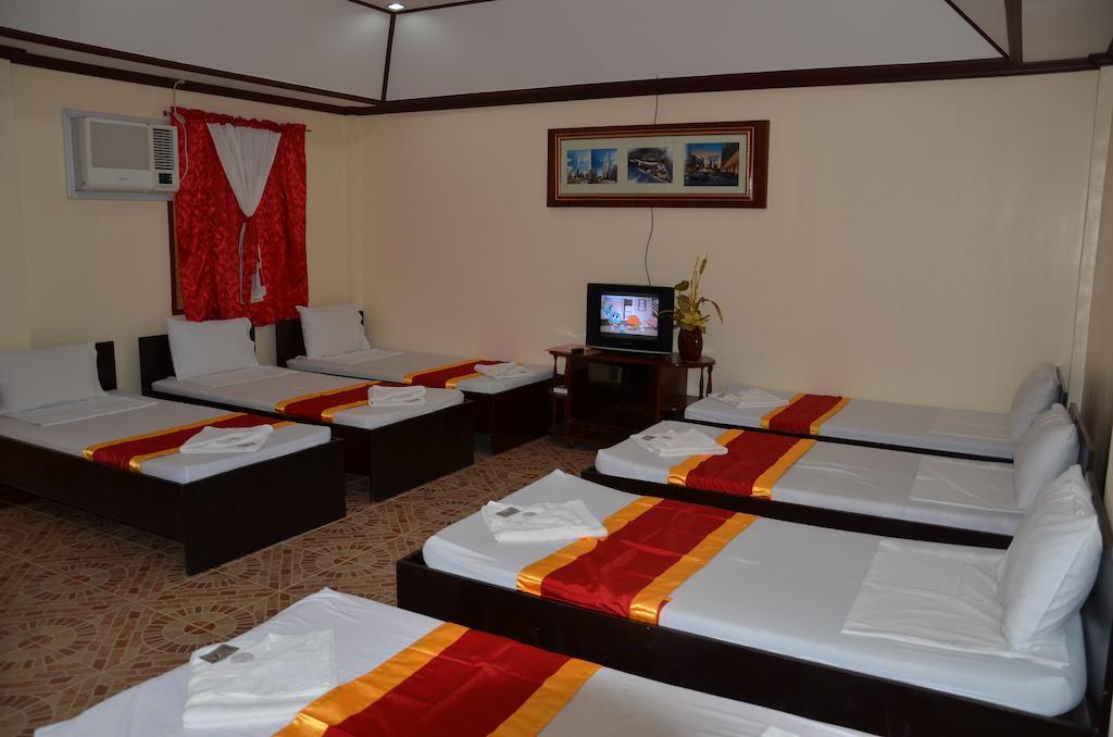 Ysabelle Mansion Bed and Breakfast Puerto Princesa Δωμάτιο φωτογραφία