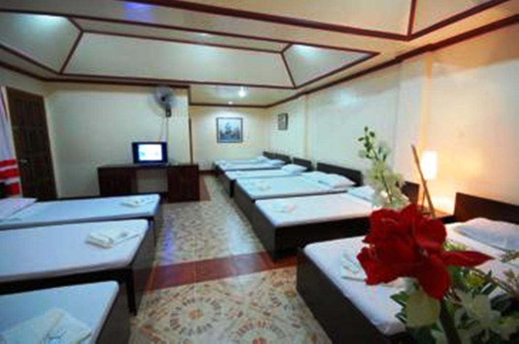 Ysabelle Mansion Bed and Breakfast Puerto Princesa Δωμάτιο φωτογραφία