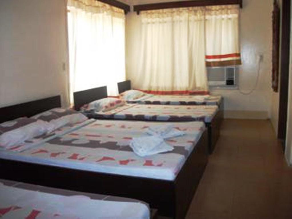 Ysabelle Mansion Bed and Breakfast Puerto Princesa Δωμάτιο φωτογραφία